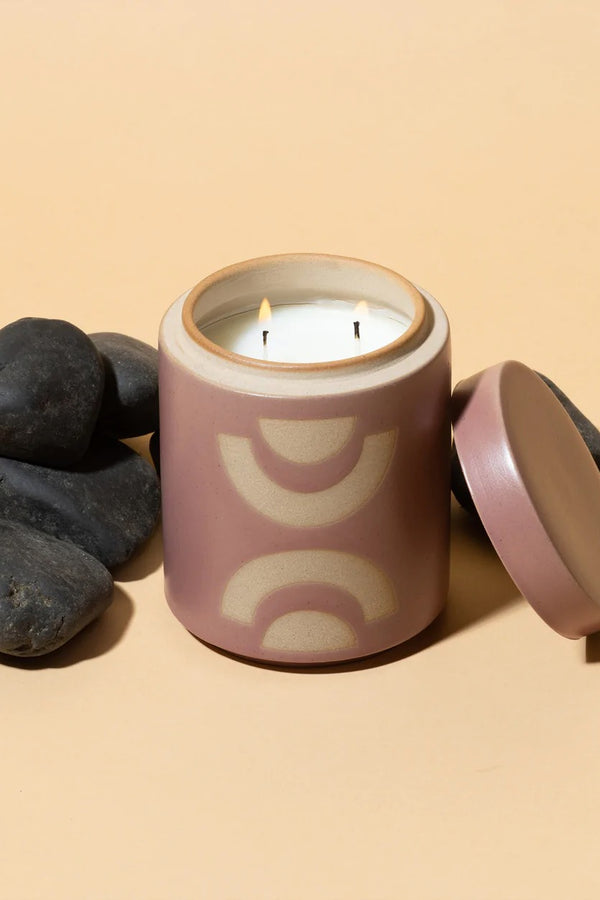 Form is inspired by gardens and the desert. These ceramic vessels with raw block shapes bring a peaceful look and glow to your home. When you're done enjoying the fragrance, each candle has a hole in the bottom, making it the perfect planter. Just peel off the sticker, flip the lip to the bottom to catch the water, and add your favorite plant.  