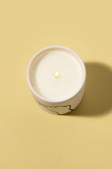 Pinky promise! Express yourself with these colorful matte ceramic candles. Each candle comes with a gold foil stamped dust cover with a fun sentiment to share with the people you love. *In Store Pickup Only* Top Notes: Bergamot, Fig, Bay Leaf, Citrus Zest, Pomelo Middle Notes: Rose, Vetiver, Green Tea, Pink Pepper, Carnation Base Notes: Cedar, Sheer Spices, Hay, Musk, Patchouli, Guaiac Size: 5.75 oz. Vessel: Ceramic Dimensions: 3.125" L x 3.125 " W x 3 " H