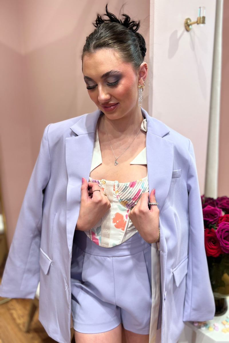Consider yourself warned, this stunning everyday blazer has been known to turn quick coffee meetings into long lunches! Add a pop of color to your office attire and be perfectly on point for that post-work happy hour. Paired here with our Eugene Bustier Top, Long Lunch Short, and most-loved Urson Boot.
