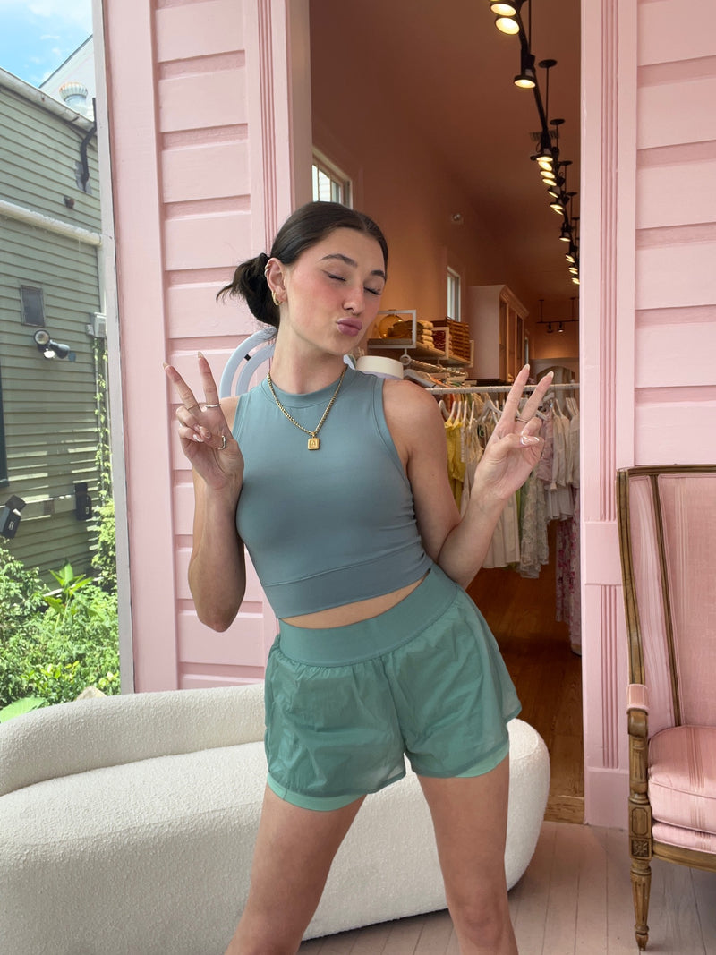 Let's face it... two is better than one and these nylon shorts are proof of just that! Fully lined with a super smooth and seamless biker short for added security and topped off with a breathable, lightweight, sweat-wicking layer, these beauts can truly do it all. Shown here with our Light as a Feather Sheer Striped Tee.