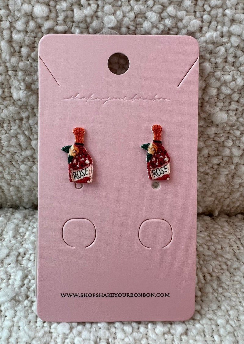 Tell 'em how you really feel about your favorite beverage with these precious Rosé all day Stud Earrings! A playful little pop of color and the cutest stackable stud for your collection.  Handmade in the USA Light weight Hypoallergenic