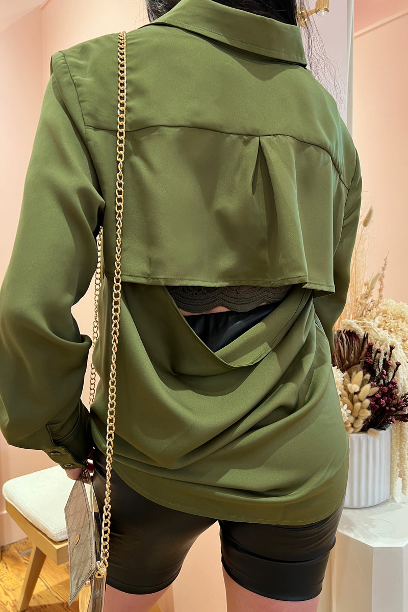 So good it'll make you do a double take, our open back satin buttondown brings a layer of sophistication and class to any bottoms. Throw it on for a day in the office and be perfectly dressed all the way to happy hour. Featuring a relaxed, flowy fit, hidden button front closure and open back detail guaranteed to turn heads.