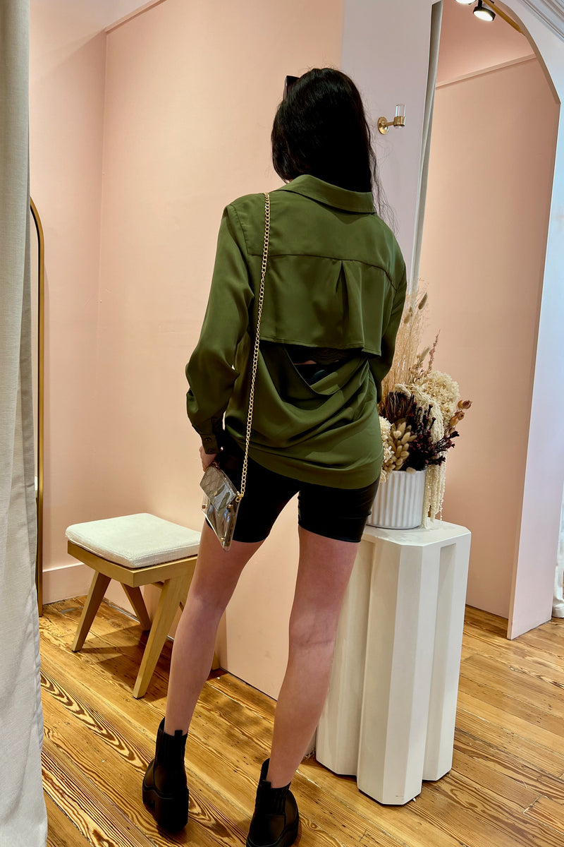 So good it'll make you do a double take, our open back satin buttondown brings a layer of sophistication and class to any bottoms. Throw it on for a day in the office and be perfectly dressed all the way to happy hour. Featuring a relaxed, flowy fit, hidden button front closure and open back detail guaranteed to turn heads.