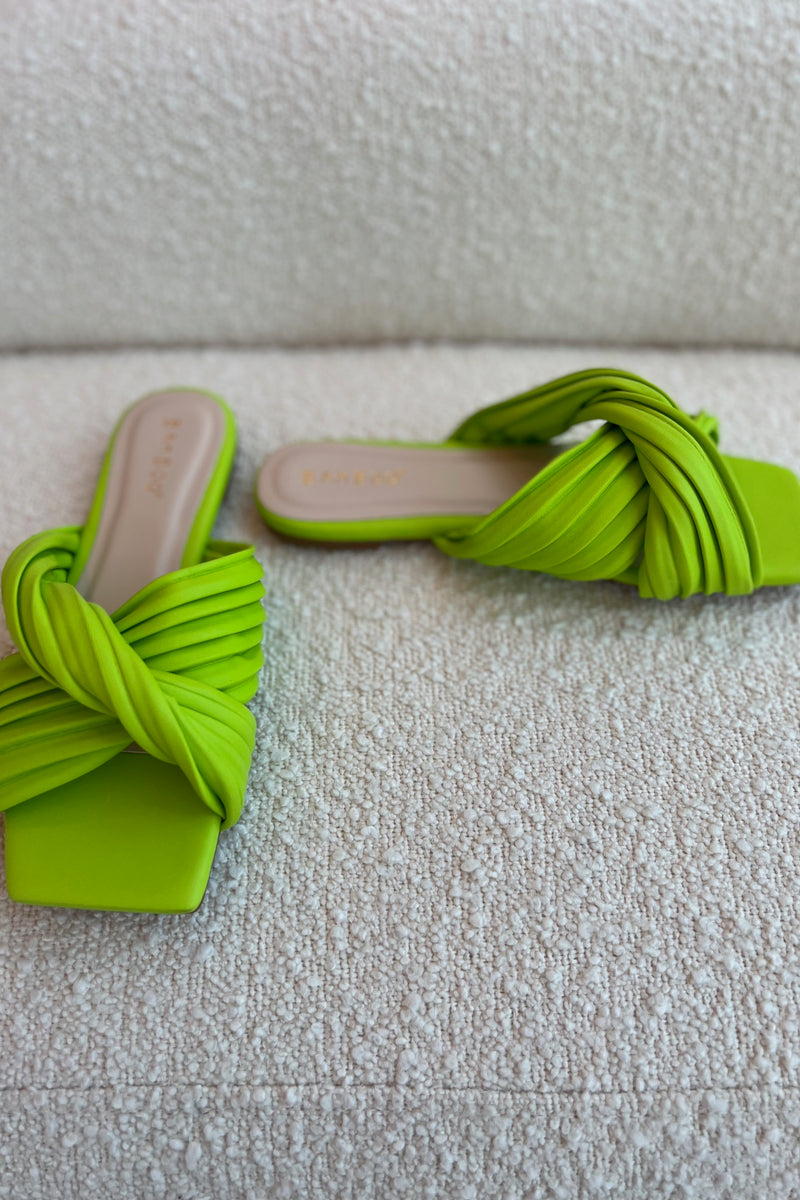 Aptly named... our Electric Slide Flats will have you and the whole town buzzing with their perfectly on trend neon pop of color! These bright beauties feature a comfort sole and scrunchy straps that guarantee you're effortlessly comfortable.