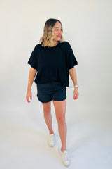 If loungewear and activewear could be perfectly blended into one, it'd be these Hot Shot High Waist Shorts! Constructed using moisture-wicking, four-way stretch fabric and has a relaxed cut and feel for all day long comfort. It features a drawstring closure with a cord locker as well as side pockets. Shown here with our At Ease Ribbed Racerback Tank and Go Long Tie Back Top.