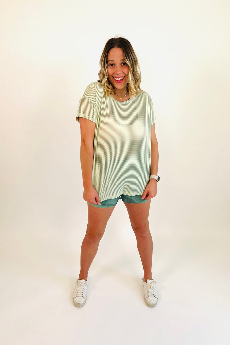 Let's face it... two is better than one and these nylon shorts are proof of just that! Fully lined with a super smooth and seamless biker short for added security and topped off with a breathable, lightweight, sweat-wicking layer, these beauts can truly do it all. Shown here with our Light as a Feather Sheer Striped Tee.