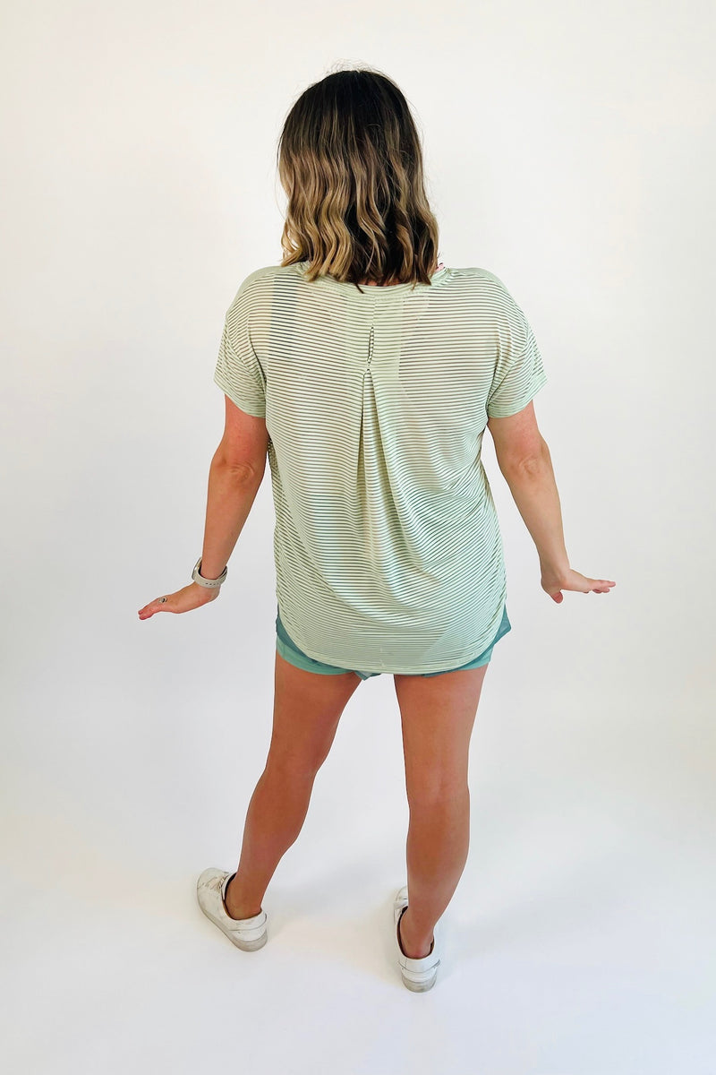 Let's face it... two is better than one and these nylon shorts are proof of just that! Fully lined with a super smooth and seamless biker short for added security and topped off with a breathable, lightweight, sweat-wicking layer, these beauts can truly do it all. Shown here with our Light as a Feather Sheer Striped Tee.