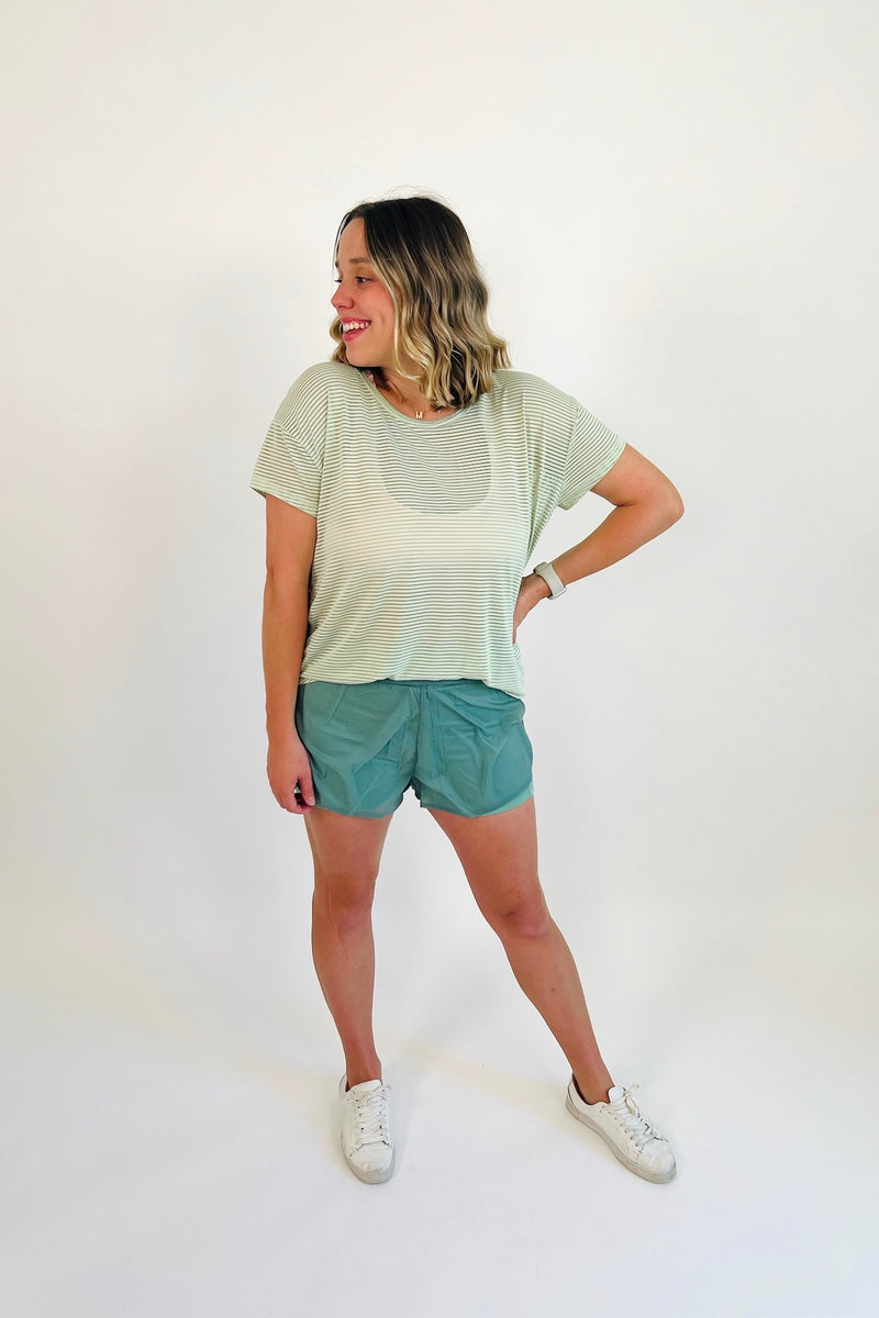 Let's face it... two is better than one and these nylon shorts are proof of just that! Fully lined with a super smooth and seamless biker short for added security and topped off with a breathable, lightweight, sweat-wicking layer, these beauts can truly do it all. Shown here with our Light as a Feather Sheer Striped Tee.