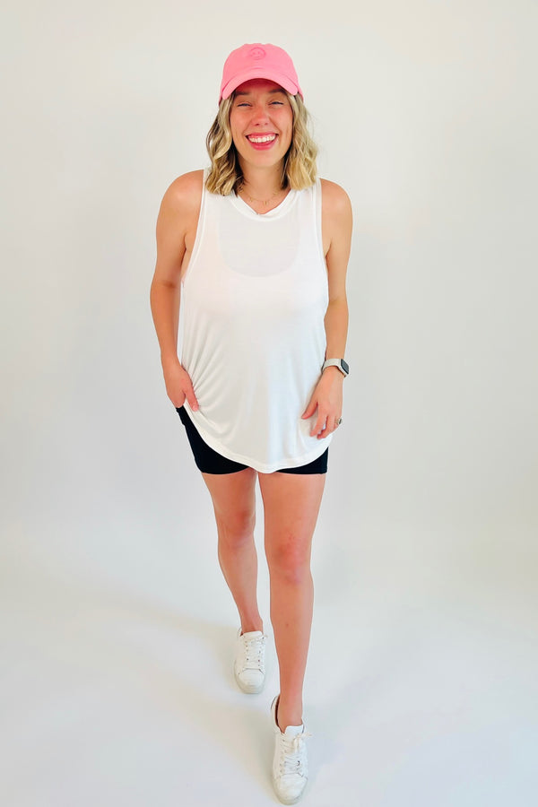 We're bringing the essentials only, and these perfect biker shorts! Hitting at the flattering mid-thigh length, with a thick, high-waist band and a sweetheart seamline on the back that perfectly accentuates your every curve, these babies are a staple thats perfect for anything from lounging to exercising. Shown here with our Raw and Real Flow Tank and Back at It Twist Front Top.