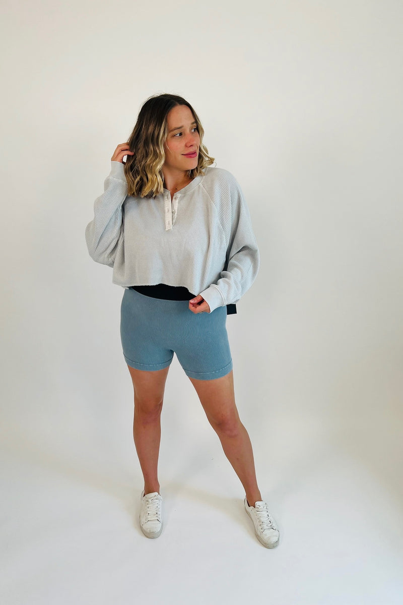 Totally at ease, these ribbed biker shorts make us want to get up and get moving! Ultra lightweight, breathable ribbed fabric with a thick elastic waist band, these gems are perfect for the sweatiest of workouts. Mix n' match or find their perfect pair with our At Ease Ribbed Tops, or layer like we've done here with our Here For It Oversized Top.