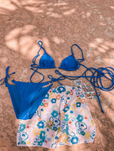 A little wild at heart, this strappy, tie bikini is our new go-to staple for the summer! Featuring metal heart decals at the bust and hips, a classic, adjustable triangle top and side-tie bottom and an edgy and sultry tie detail, this duo gets better as the days get longer.
