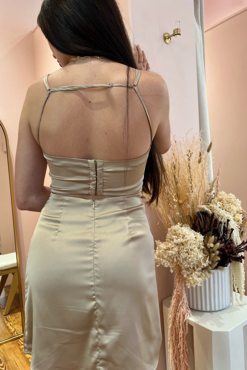 There's no other way to put it, we're head over heels for this stunning silk mini! Featuring a flattering bias cut, modern and edgy curve bustier detail, classic slip silhouette and eye-catching back, this gem can be edged up and dressed down for date night, or elevated for a special event with your favorite heels.