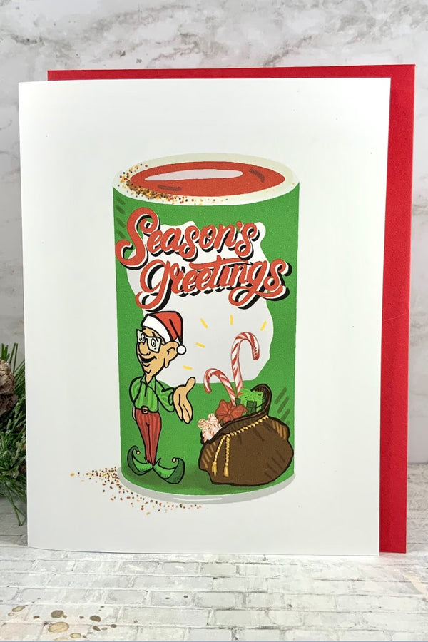 Season's Greetings from Tony the Elf! For those who put Tony's on everything, this card is guaranteed to bring and a touch of Creole Christmas Cheer no matter where they are. Happy Holidays!  Hand-drawn design Made with love in Houston, TX. Blank inside