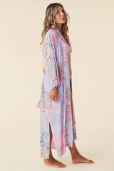 Our Cha Cha Maxi Robe from Spell is their classic Robe shape reimagined with the signature Cha Cha patchwork print in ever dreamy Jacaranda. Featuring patch pockets at the sides and a detachable waist tie, this Robe is perfect for layering over intimates, lounge wear  and swim, or to add a pop of color to your tank and denim shorts.