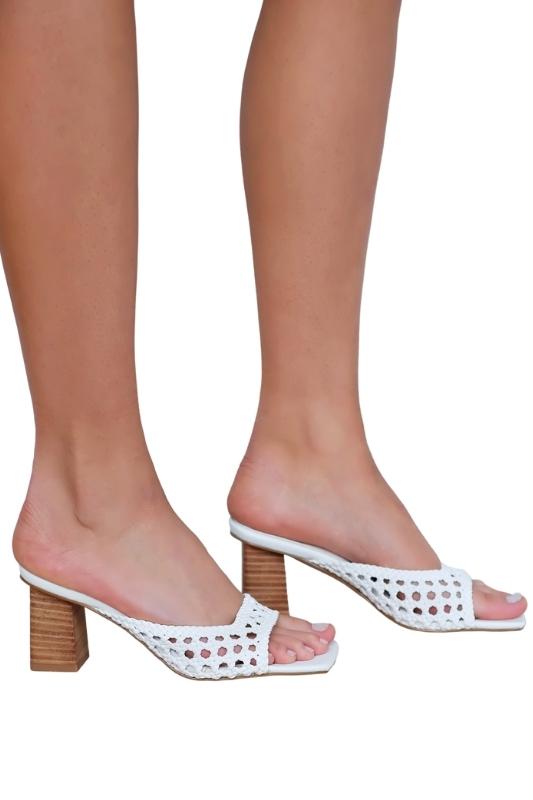 Y'all...we are crushing HARD on our perfect Usari Mule! With some good old fashioned retro vibes and ample amounts of class, these woven beauties truly can do it all. Toss them on with a dress to be totally put together yet perfectly comfy, or throw them on with jeans and a tee for an instantly elevated look.  Run true to size 2.5" Heel Square toe