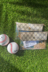 You know you need me. These stadium approved clear bags can be worn as a fanny pack or crossbody and feature an upcycled patch from luxury handbags!  8.5 in x 6.7 in (fits iPhone Pro Max)  Authentic upcycled material from luxury handbags Clear bag policy approved for any and all concerts, games, and indoor arenas 