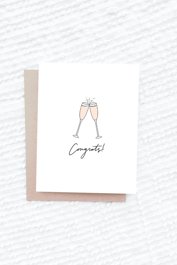 Simple and stunning, this hand-drawn, hand-lettered card is the perfectly elegant way to congratulate that special someone on their important day!   A2 Card and Kraft Envelope Dimensions: 4.25 x 5.5 in Blank inside Hand-drawn, hand-lettered