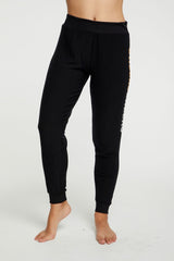 Bring four times the CHEER to your holidays this year by wearing our festive graphic pants. Pair with our matching pullover for extra festive points!  Cozy knit Color:  True black Cheers Pant Fabric Content: 46% Polyester 46% Rayon 5% Spandex Model is 5'7" and wearing a size small Imported