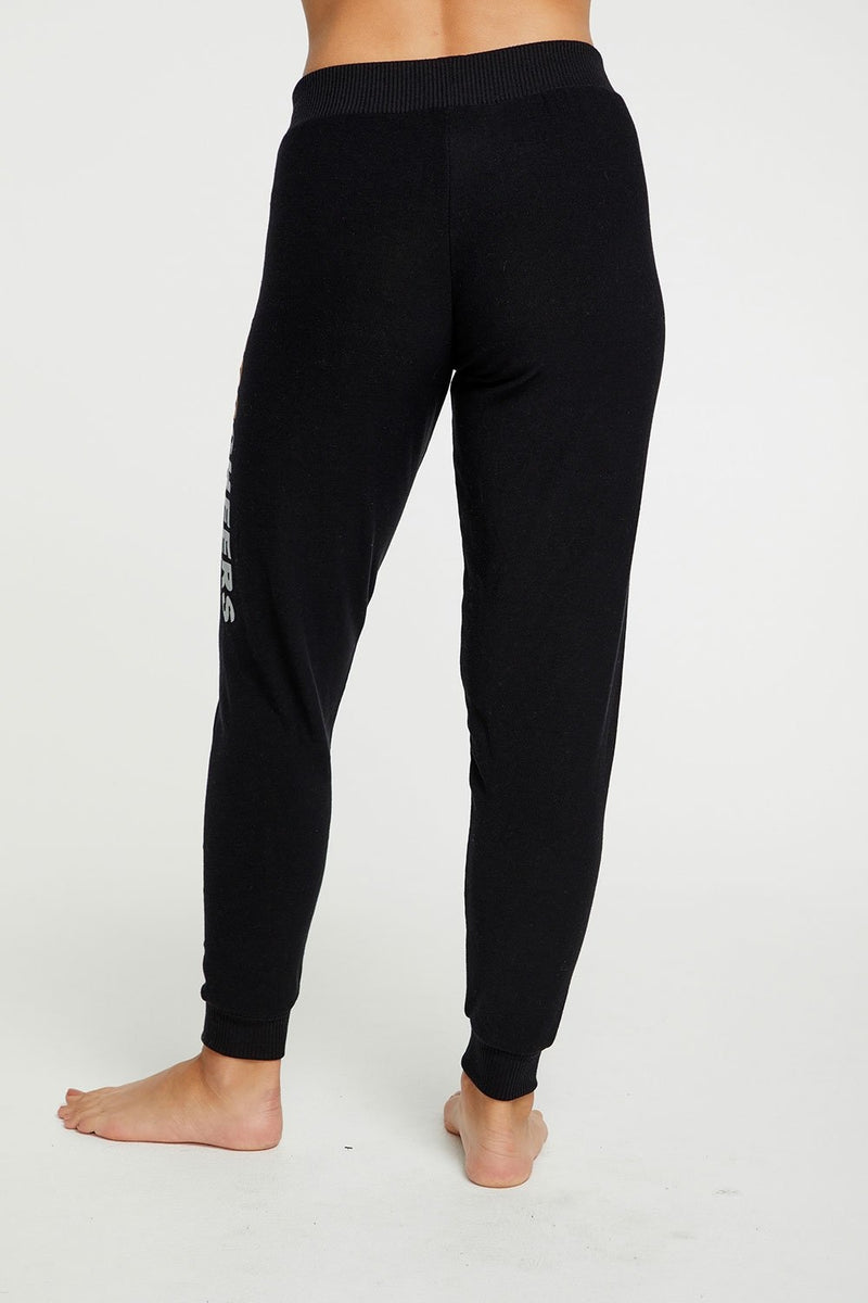 Bring four times the CHEER to your holidays this year by wearing our festive graphic pants. Pair with our matching pullover for extra festive points!  Cozy knit Color:  True black Cheers Pant Fabric Content: 46% Polyester 46% Rayon 5% Spandex Model is 5'7" and wearing a size small Imported