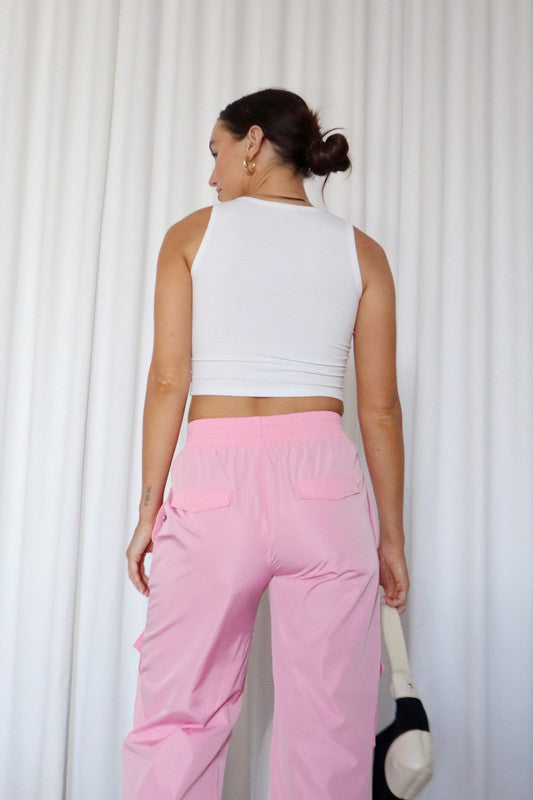 Howdy Baby! Your new favorite go~to tank has arrived! So cute, so soft, and just perfect for upcoming carnival season! Shown here with our Cargo Pant and Country Roads printed denim!   Model wearing size small  Ribbed material Cropped 