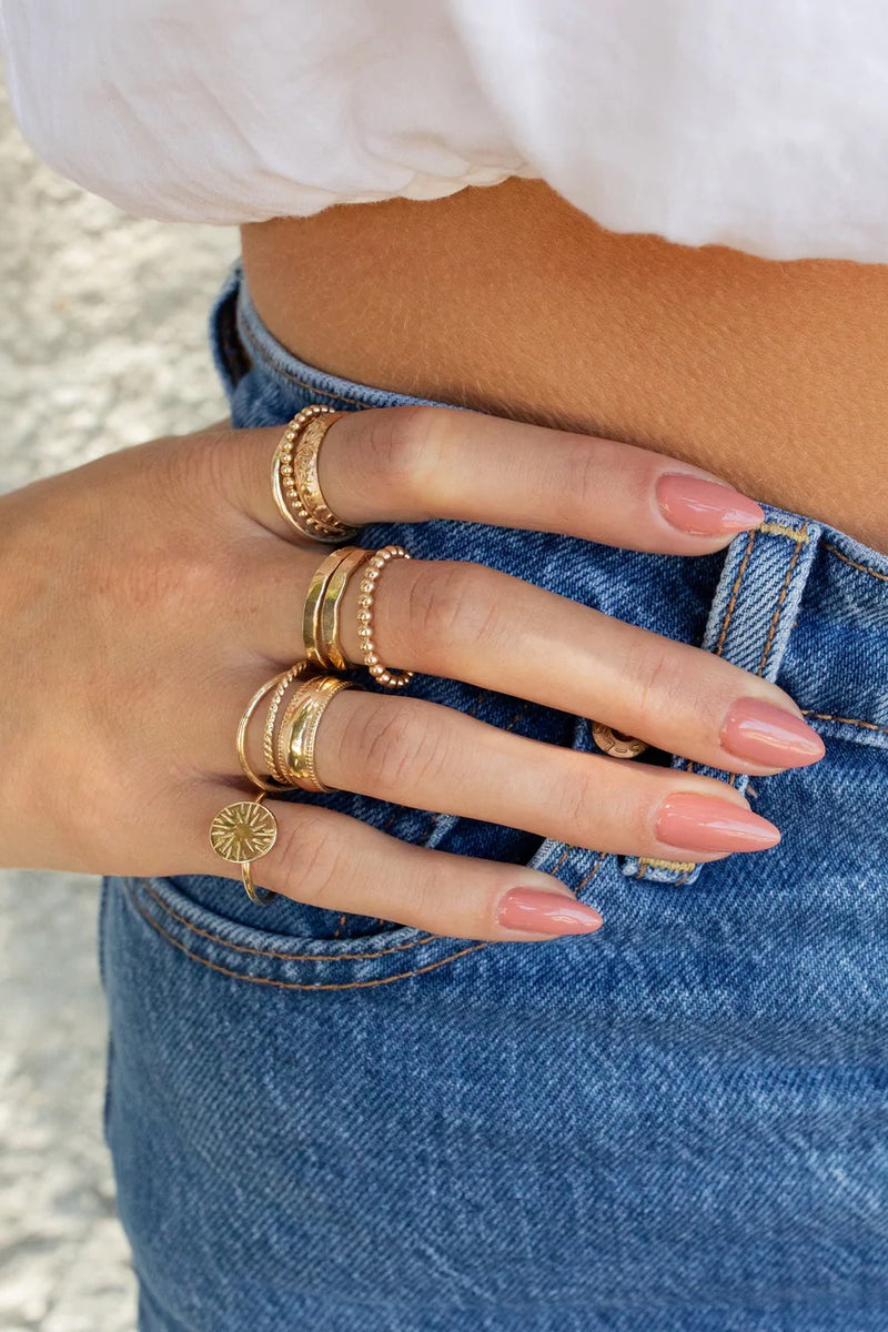 Introducing the bolder version to our most-loved Orb ring, this gem features a thick band with a beaded detail. Stack a couple for extra edge, or seamlessly layer it in with your other favorites!  Gold Filled Handmade in Costa Mesa, CA.