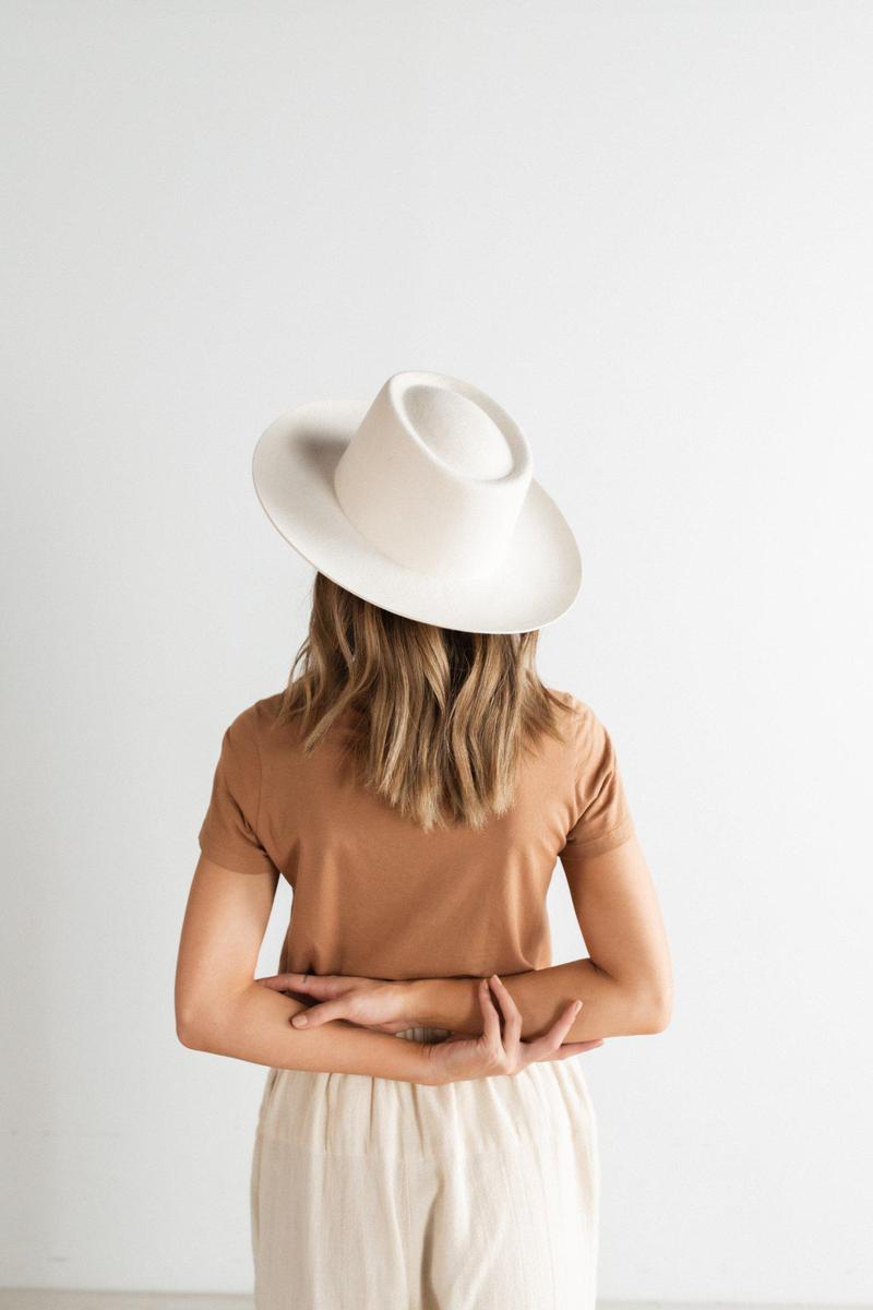 Things are looking up. The Ty is a tall telescope crown with an upturned brim made for versatility, you can customize with any band.  100% Australian Wool Stiff Wide Brim Fedora Style Dimensions: Crown - 11 cm, Brim - 9 cm  